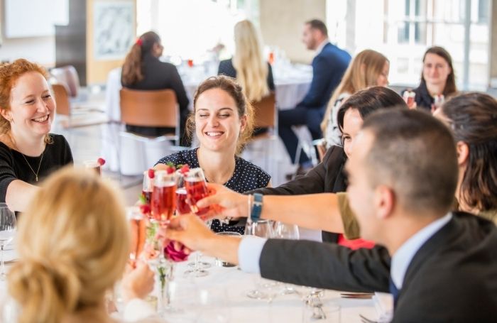 People celebrating at a RIBA summer event