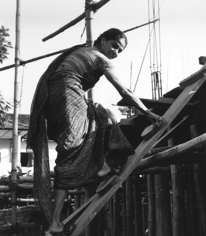 Minnette de Silva inspecting concrete pillars of De Saram house Colombo c1956 RIBA Collectionspng