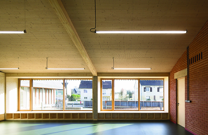 Bioclimatic School large room with under window storage spacejpg