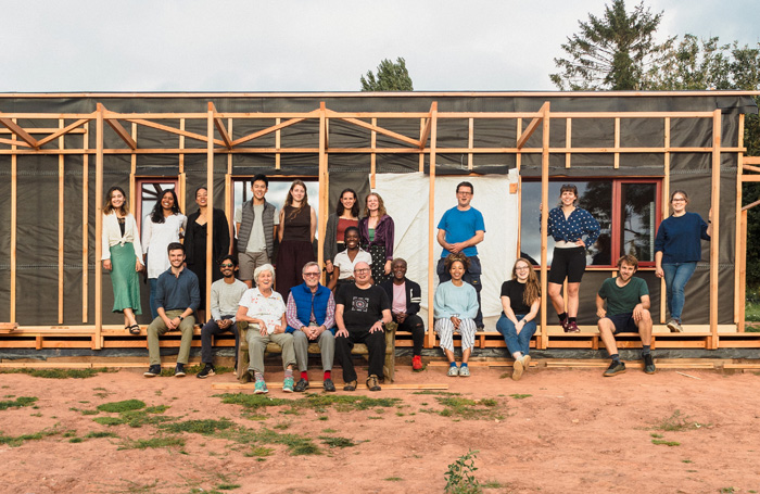 Studio Bark team with students and clients on sitejpg