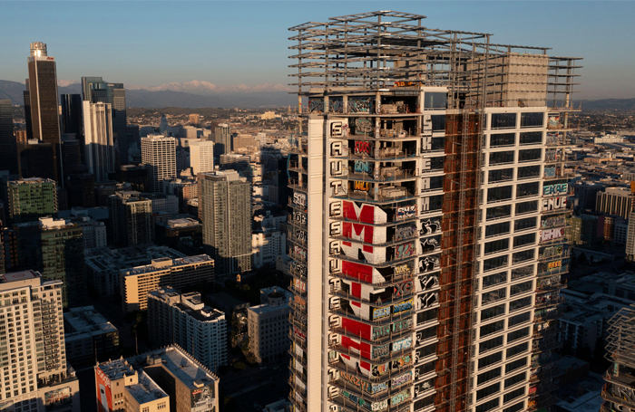An abandoned and graffiticovered luxury condominium tower in Los Angelesjpg