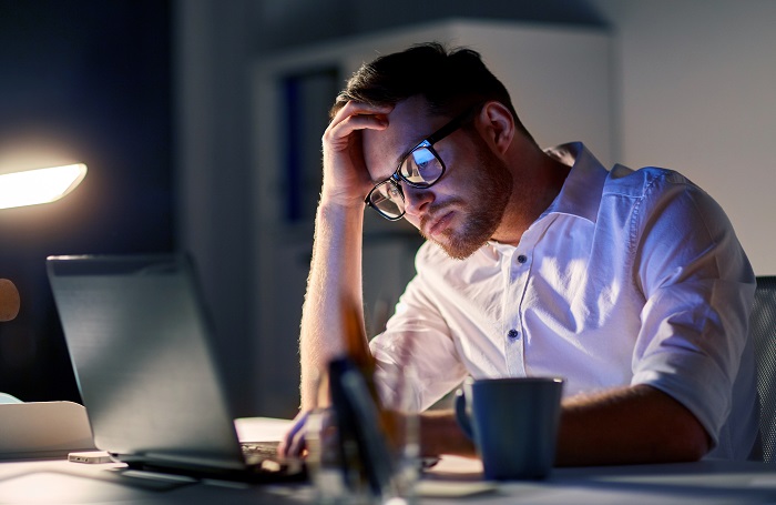 An architect staring at his laptop after being targeted by cybercriminals 700x455jpg