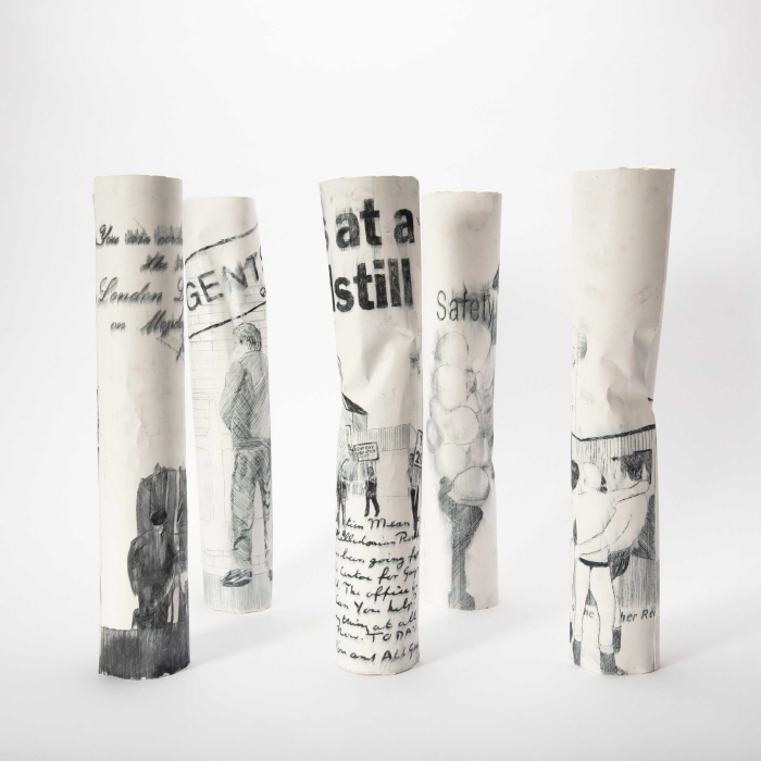 Five tall thin sculptures with etchings Alastair Walkerjpg