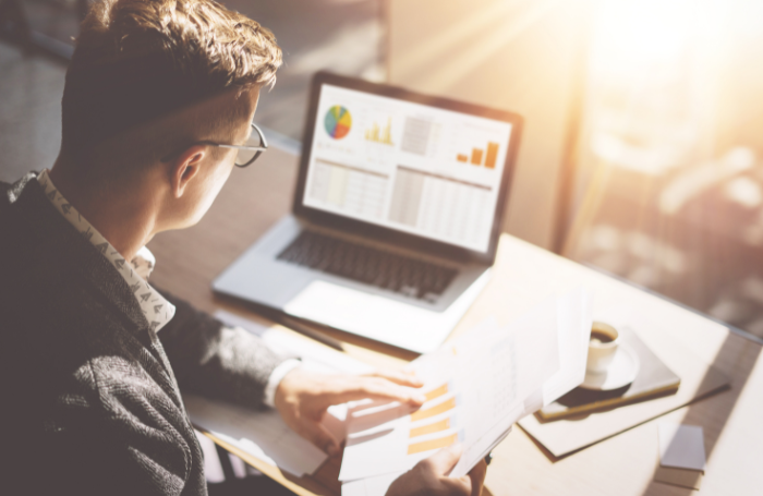 Man looking at RD tax relief on laptop 700x455png