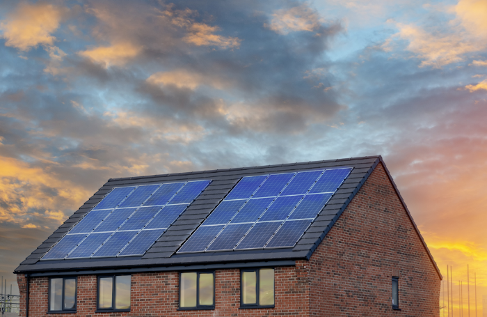 Photovoltaic solar panels on the roof of new house stock imagepng Photovoltaic solar panels on the roof of new house