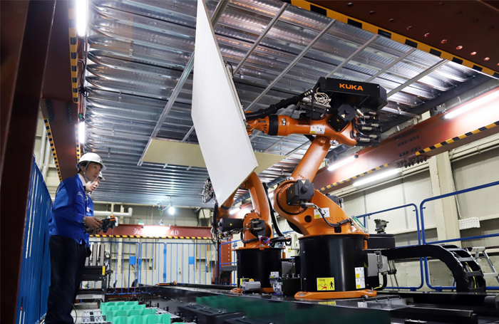 RoboBuddy Floor robot and factory worker 700jpg