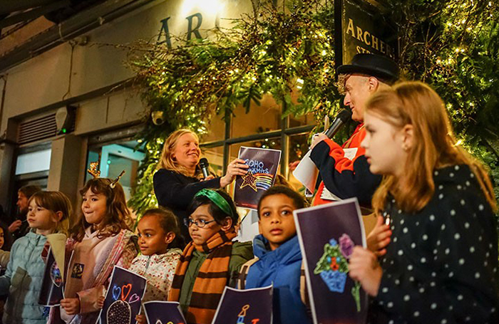 Soho Parish school children holding pictures of their street light designs 700x455 Tunde Valiszka jp