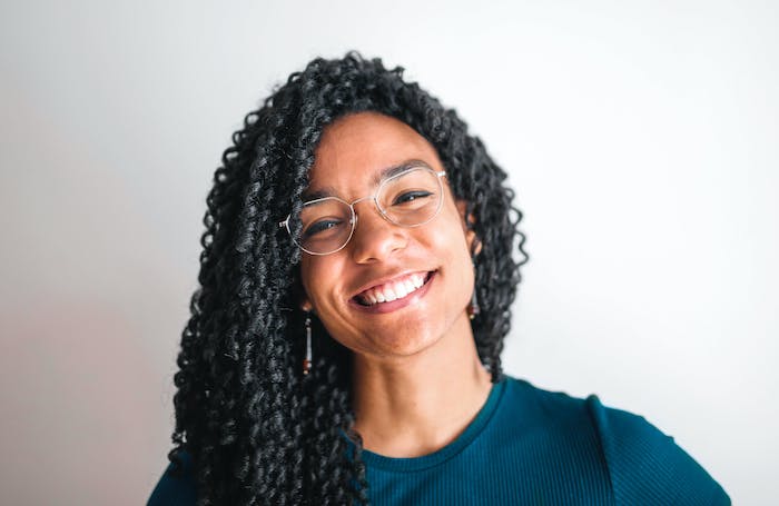 Woman looking into the camera and smiling LARGEjpg