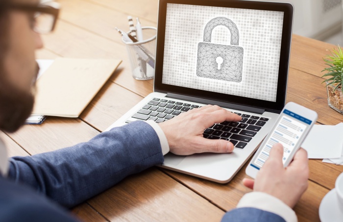 man at laptop after a hack700x455jpg