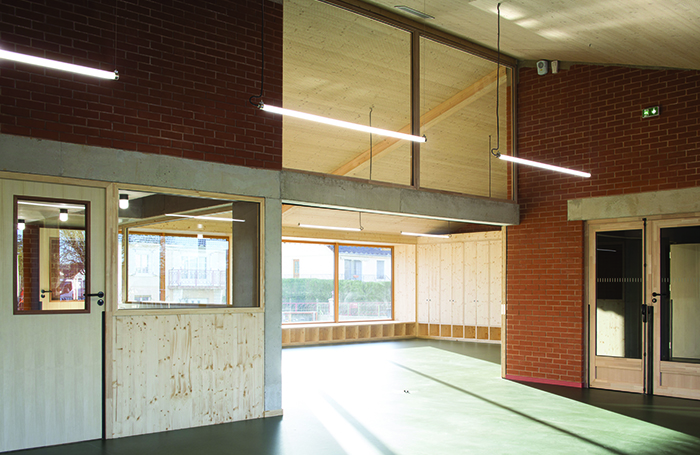 Bioclimatic School large windowed open roomjpg