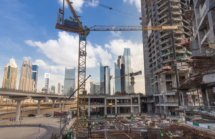 A construction site with high rise buildingsjpg