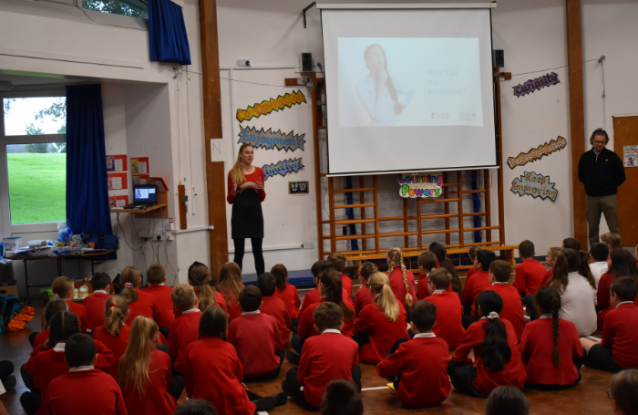 Nick and Amber talking to year 5 and 6 students at Ysgol Mynydd Isa about their jobs700x455png