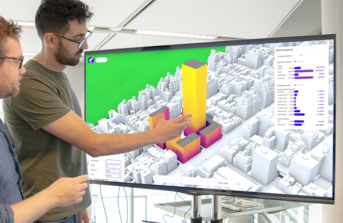 Two architects using a touch screen to look at building plans700jpg