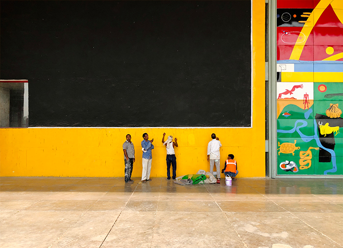 MencleaningyellowwallarttilesMohammad Ziyaad Hussein Oozeer700x505jpg