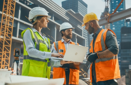 A group of architects on a building site